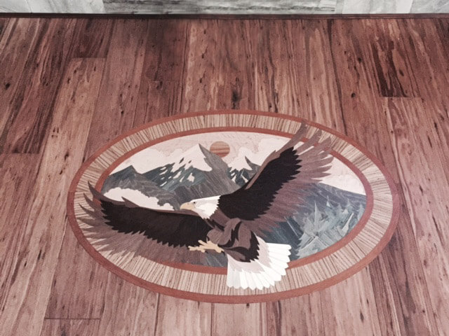 Custom Eagle Wood Floor Medallion Testimonial Room Scene