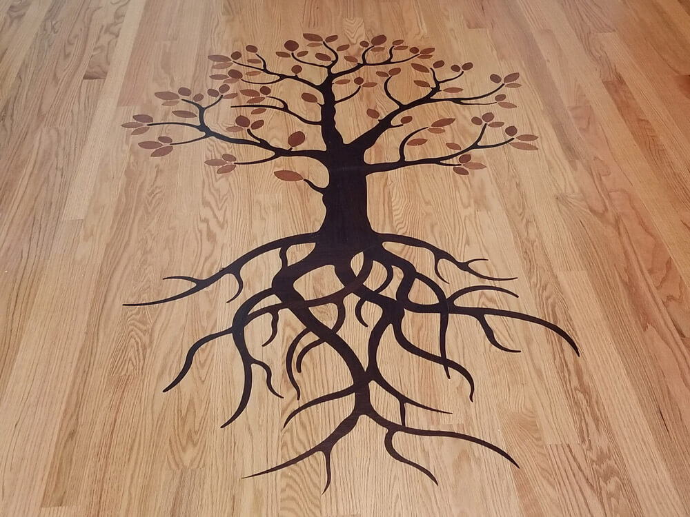 Custom Tree Hardwood Floor Inlay Testimonial Room Scene